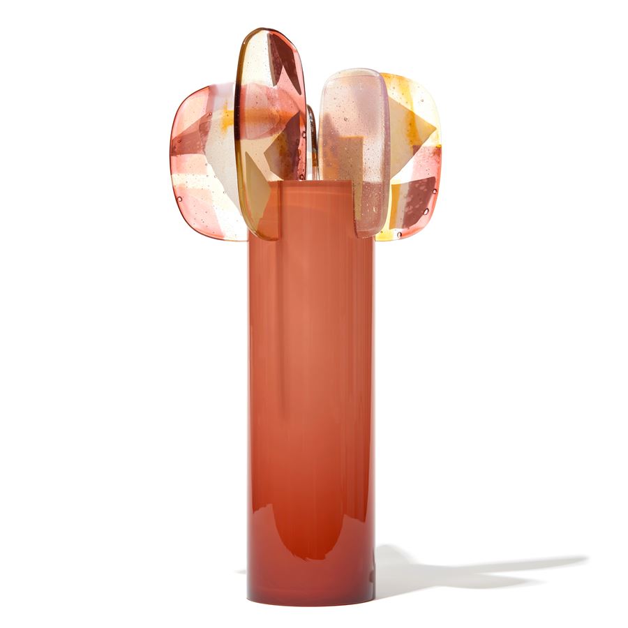 rich amber coral cylinder with five rounded finials with abstract patterns in pink magenta yellow gold and alabaster hand made from blown and fused glass